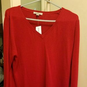 Roz & Ali red sweater