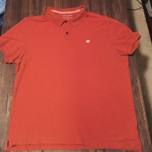Orange polo shirt