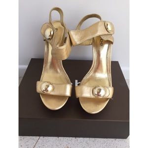 Bebe Gold Platform Sandals