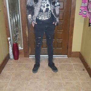Rude brand black skinny jeans custom shredded.