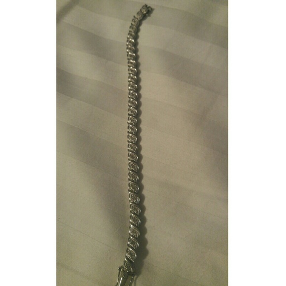 Sterling silver bracelet with diamonds in band
