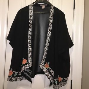 Black kimono with minimal designs on the edges