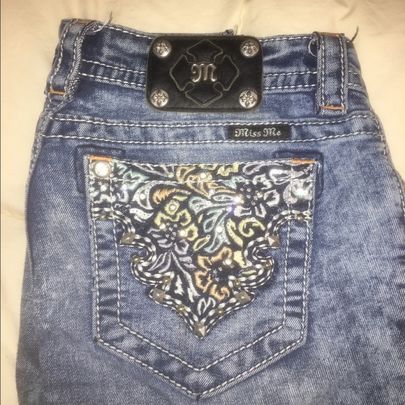 Size 28 Boot Cut faded jeans.