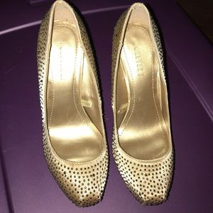 Sparkly high heel gold shoes