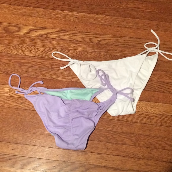 Purple and white vs bikini bottoms $10 each
