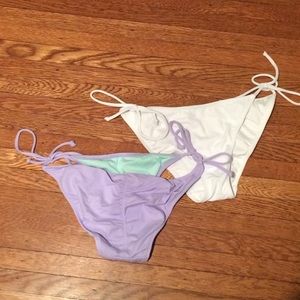 Purple and white vs bikini bottoms $10 each
