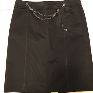 WHBM black skirt with removable chain detail.