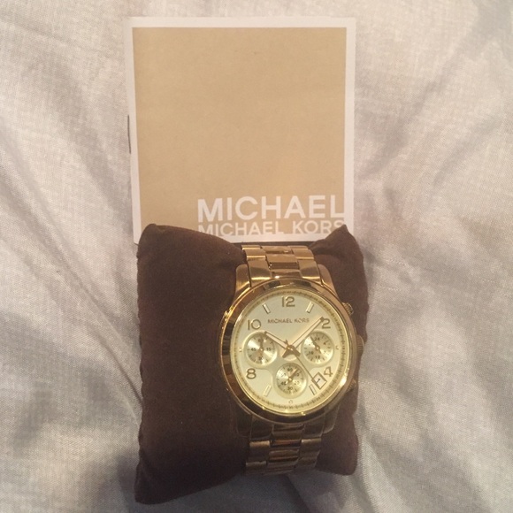 Michael Kors gold watch.