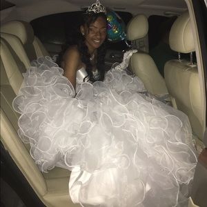 White gown with ruffled bottom