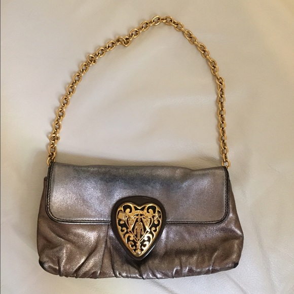 Authentic Gucci gold metallic leather clutch