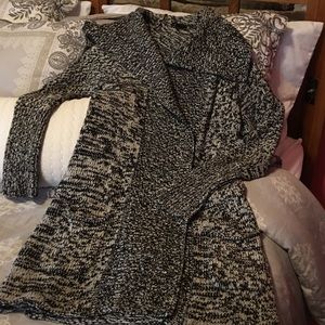 Knee length knit sweater