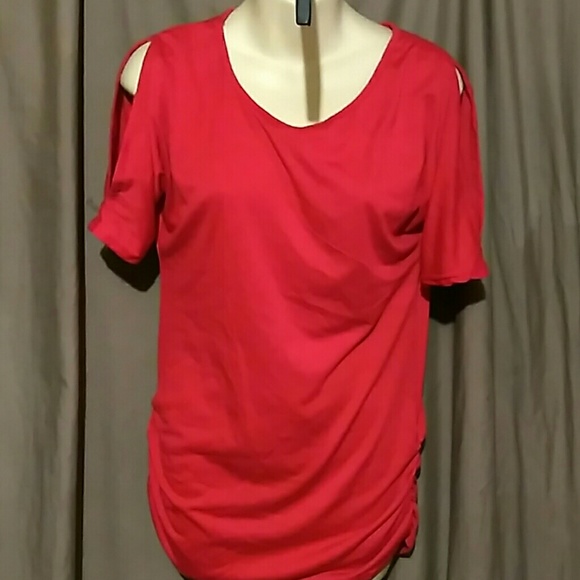 NWOT top with cut out sleeves and bunched on sides