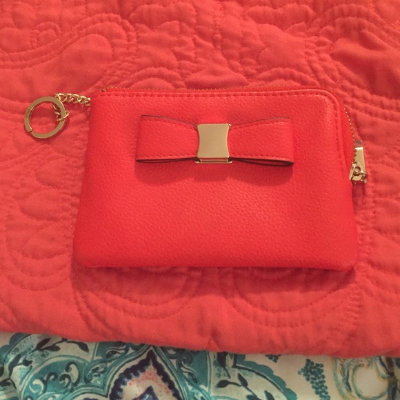 Coral colored wallet with key ring and bow accent - Picture 1 of 2