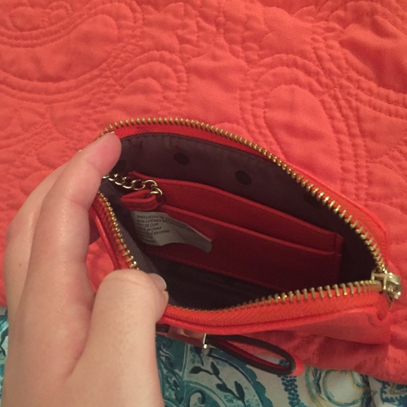 Coral colored wallet with key ring and bow accent - Picture 2 of 2