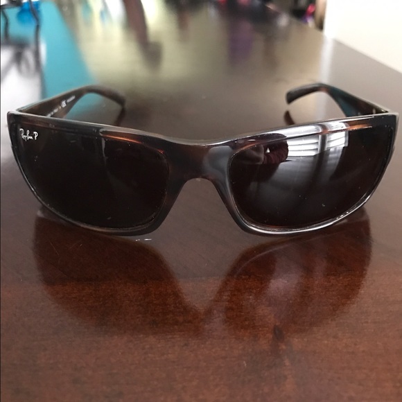 Ray-Bans wrap around brown