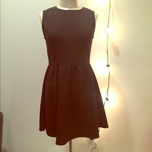 Short black high neck dress with floral pattern