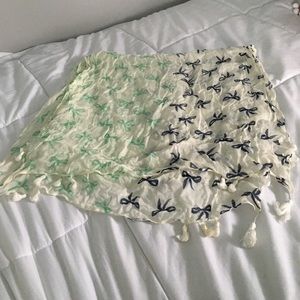 Blue and green bow scarf