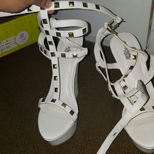 Strappy white wedge sandals
