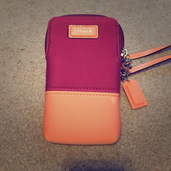 Coach Wristlet that fits your phone.
