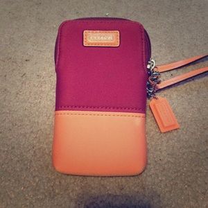 Coach Wristlet that fits your phone.