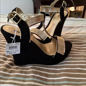 Never worn black & gold wedges