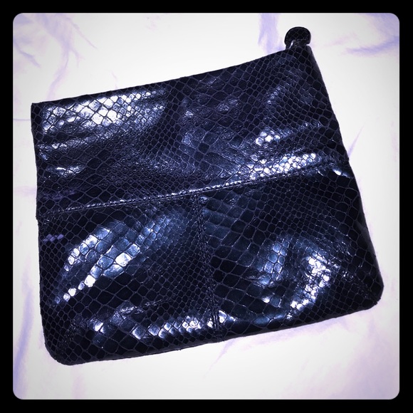 Dark purple animal skin fold over clutch