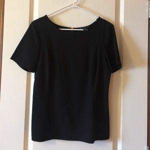 Classic black stretch top with zipper detail