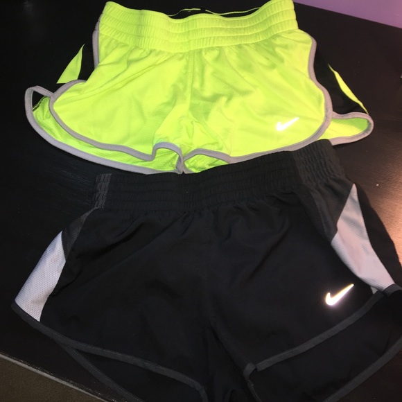 2 pairs of  Nike women's dri fit running shorts