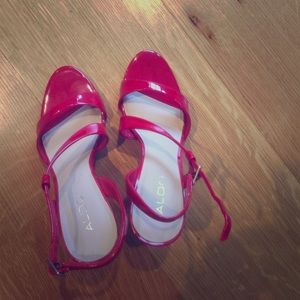 Aldo red pumps.