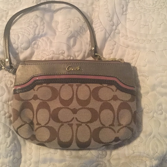 Coach wristlet beige gold pink accents