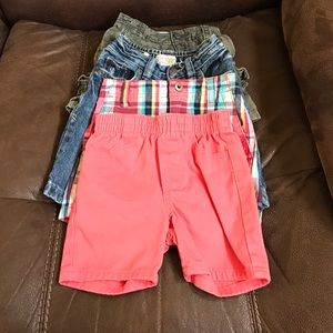 Lot of baby boy clothes.