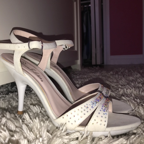 White heels with rhinestone detailing