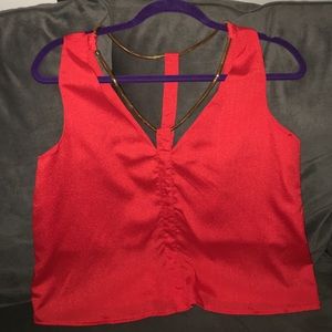 Adorable Fashionomics top with gold chain detail!