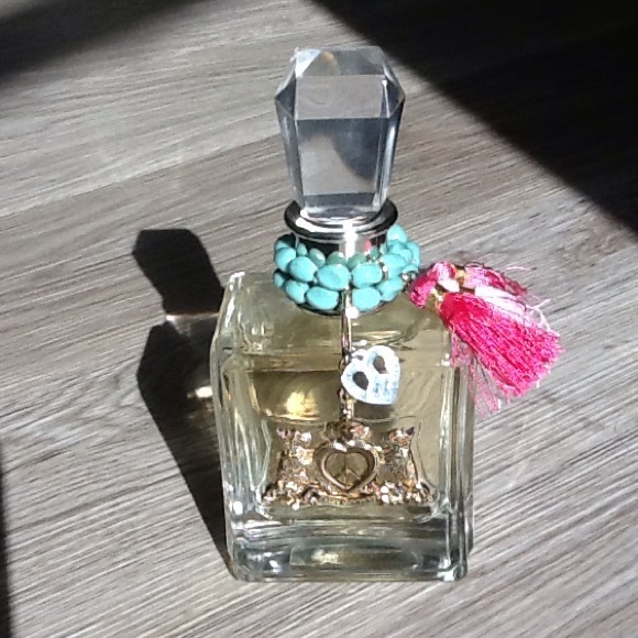 Large 3.4 ounce Juicy Couture perfume