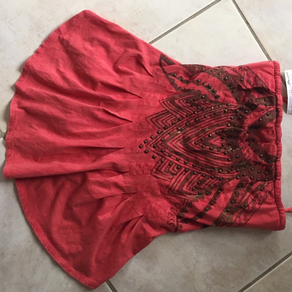 Guess Top never been used . New with tag