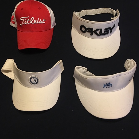 3 golf visors and titleist golf hat