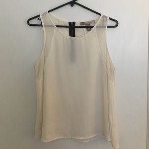 Cream tank with mesh lining on shoulders