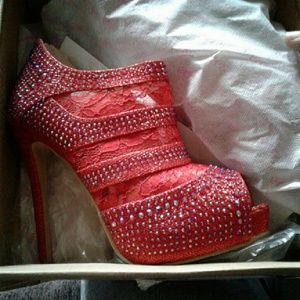 Red rhinestone pumps