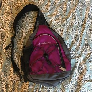 Eddie Bauer purple and grey sling pack