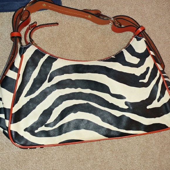 Dooney & Bourke Handbag/purse with matching watch