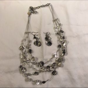 Chico silver necklace with matching earrings.