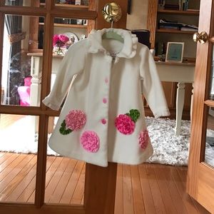Beautiful cream colored coat with gorgeous flowers