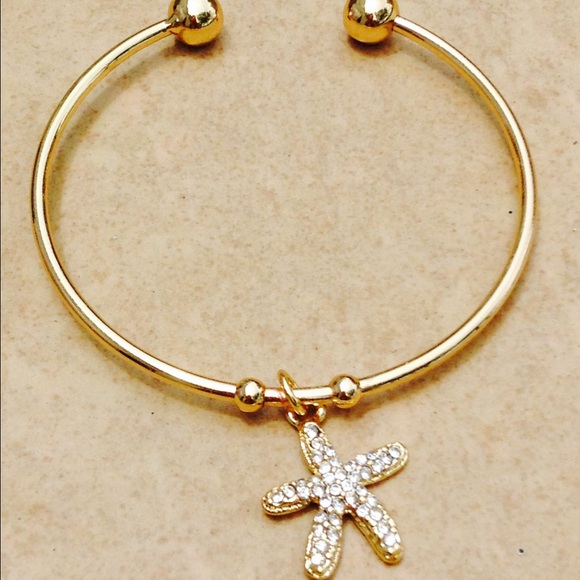 Gold Tone Crystal Starfish Charm Cuff Bracelet