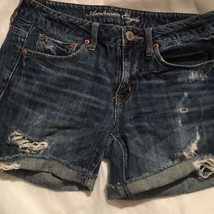 AE distressed boyfriend mid length shorts