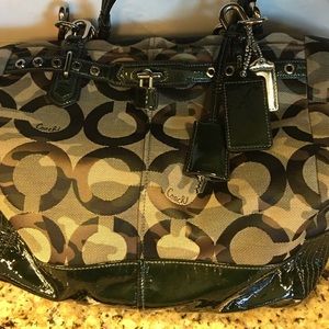 Coach camo purse, comes with dust bag.
