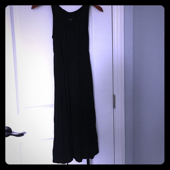 Black maternity dress, hits the knees.