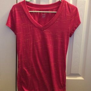 Pink V-neck with orange accents