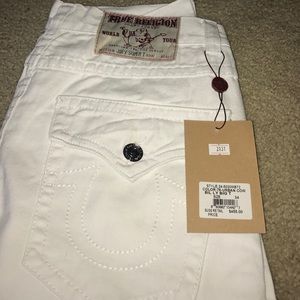 All white True Religion jeans