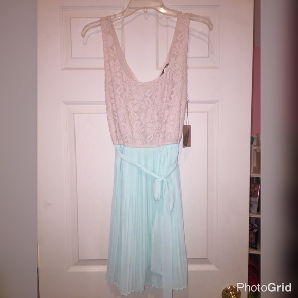 White lace and turquoise dress