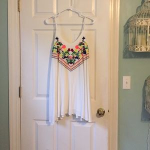 White mini dress with flower details